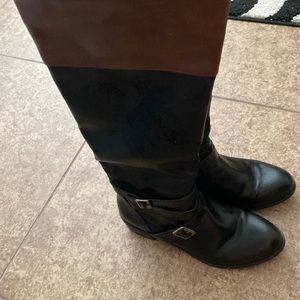 Riding boots in black and top brown